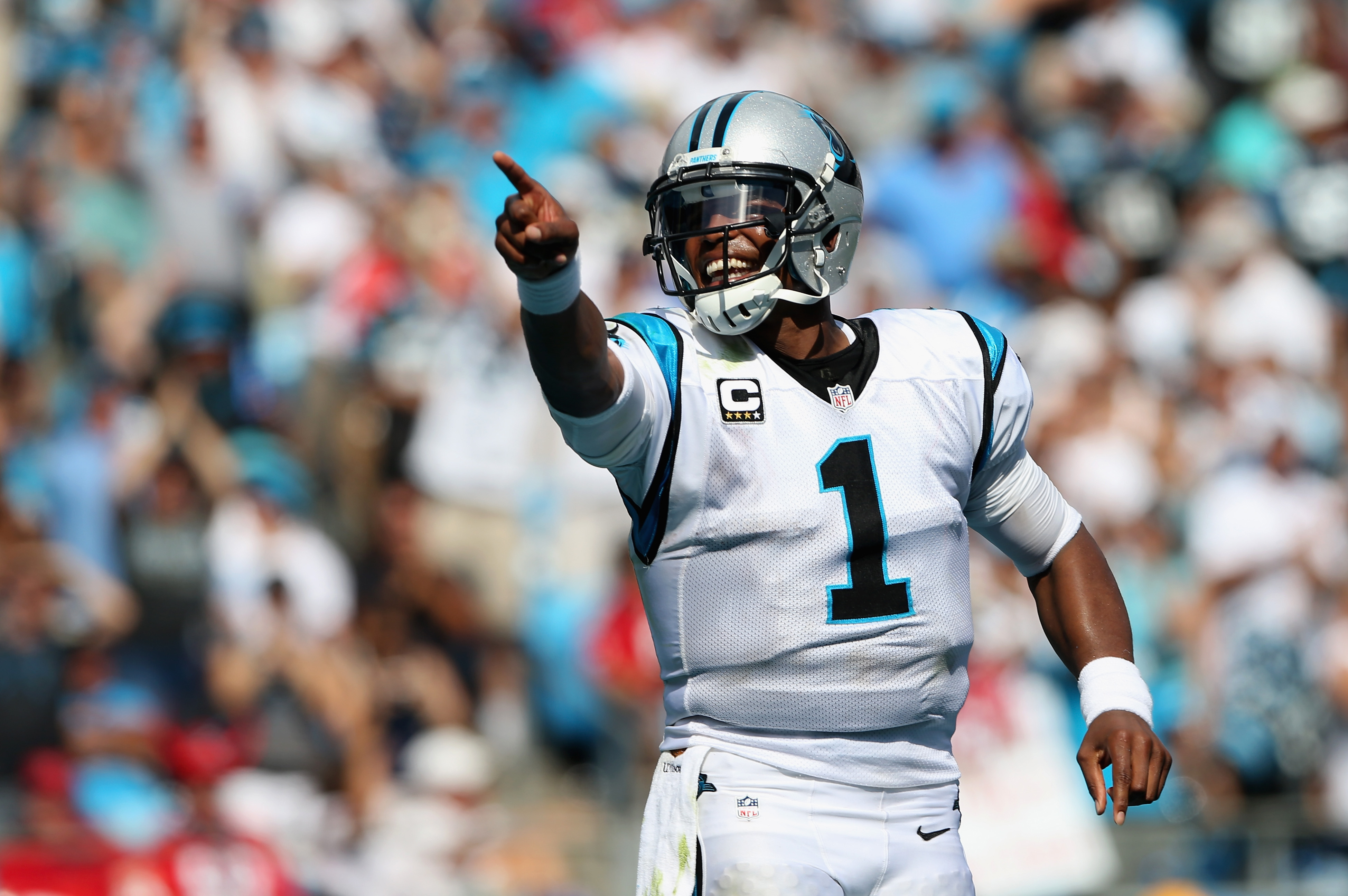 Carolina Panthers' Cam Newton (1) celebrates with Carolina