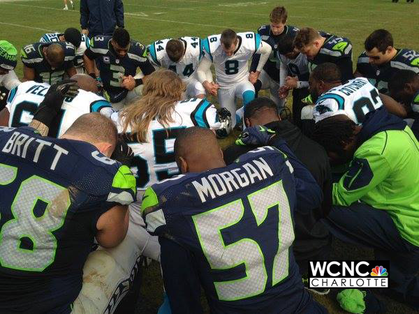 Story behind the Panthers, Seattle postgame prayer photo