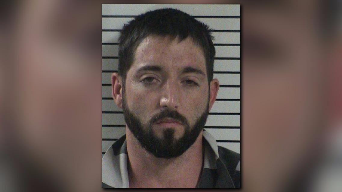 Pocket dial leads police to wanted felon