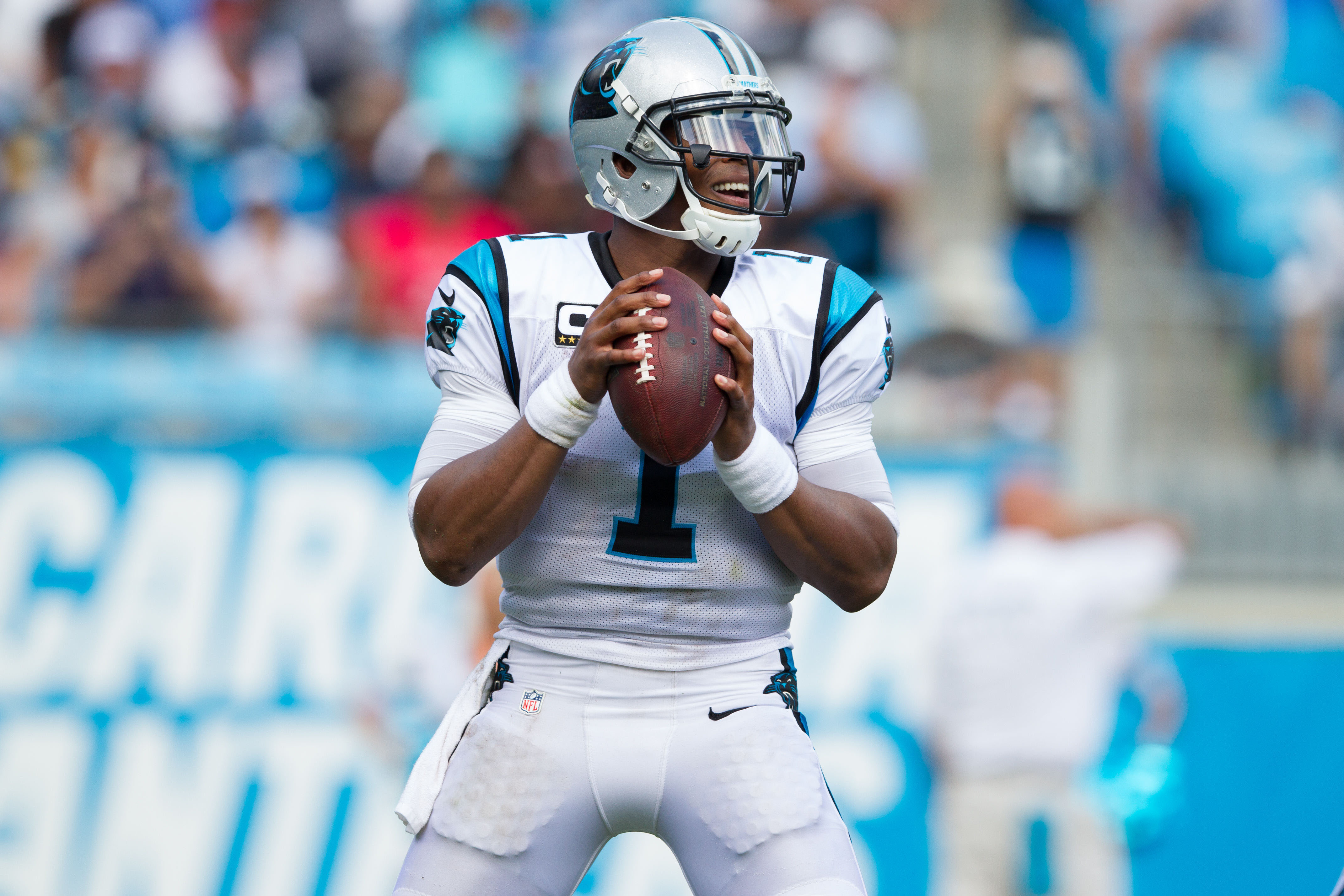 Cam Newton of the Carolina Panthers drops back to pass against the