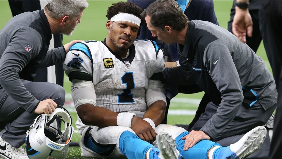 Cam Newton of the Carolina Panthers warms up before playing the