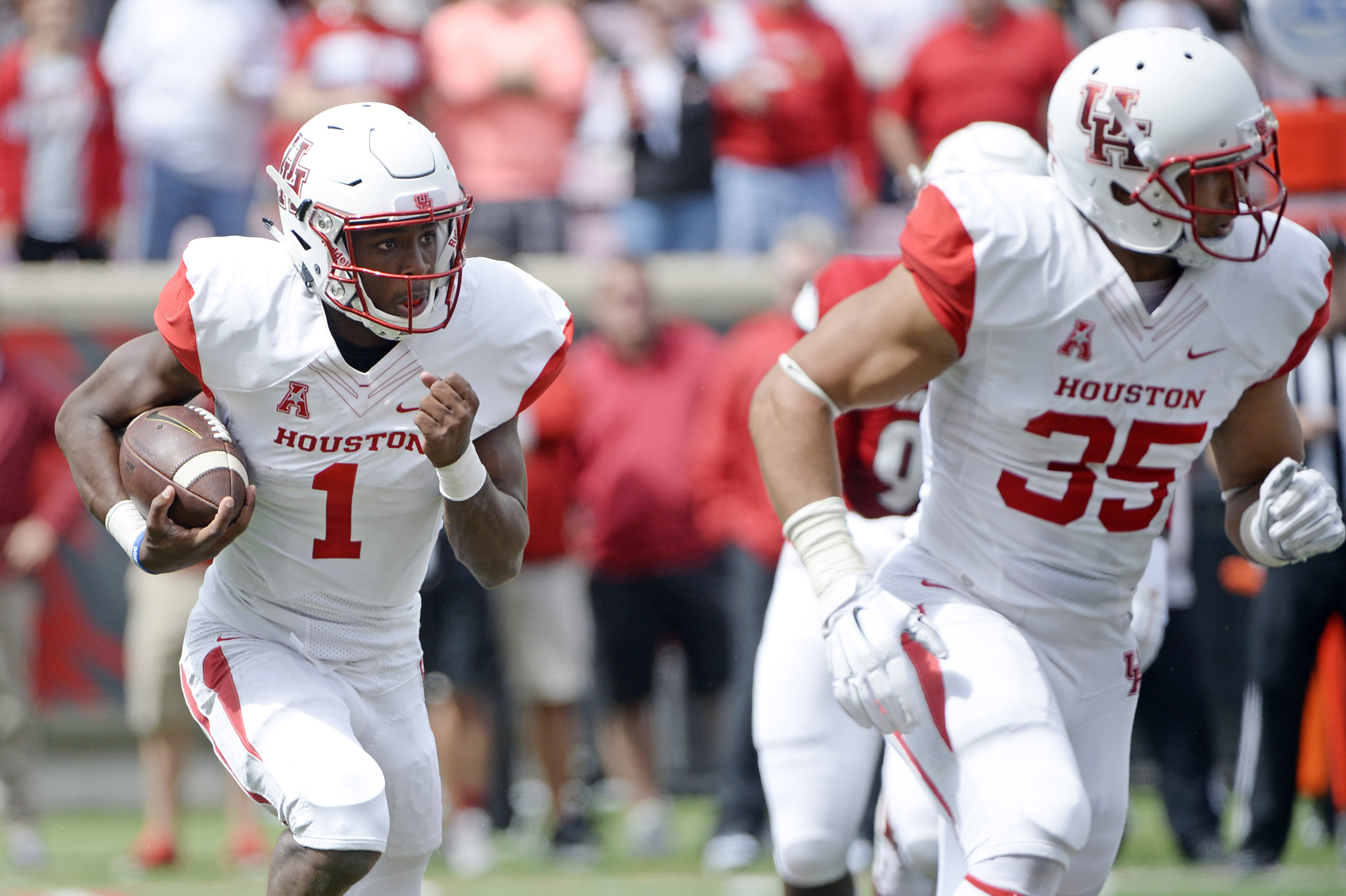 Ward throws 3 TDS, rallies Houston past Louisville 34-31 | wcnc.com